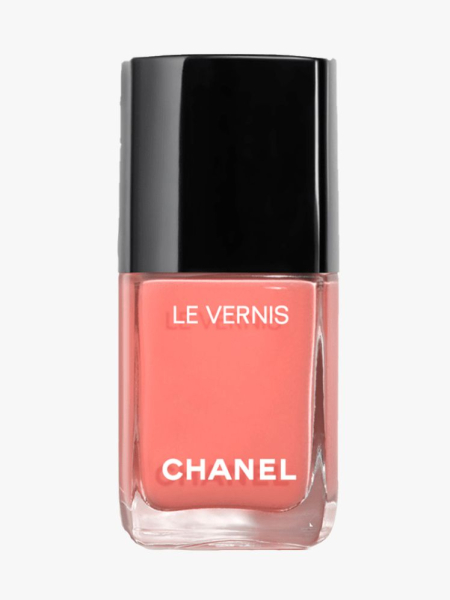 Chanel Le Vernis Longwear Nail Colour jar of peach nail polish with black cap on light gray background